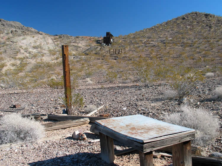 This shot doesn't count 'cause the ore bin just happens to be in the background.  It's the sturdy metal table sitting in what appears to have once been a structure that attracts our attention.