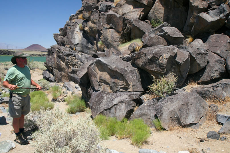 Another short drive brings us to a craggy pile of boulders at the southern end of Little Lake.  As Jack explains, this site is composed of a dense concentration of petroglyphs with a few colorful pictographs mixed in as well.