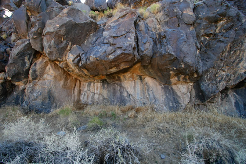 Although we know that there are no major rock art sites in this area, we nonetheless feel certain that something will turn up.  In fact, Niki has already found a couple of small pictographs done in white on this rock face.