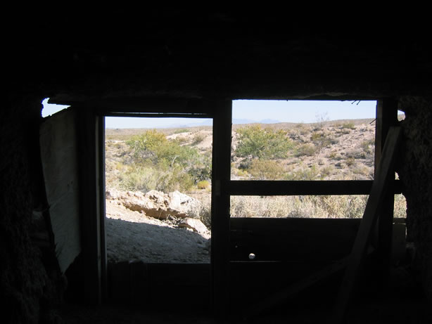 Inside a dugout looking out.