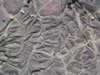 Closeup image of slag heap. (97kb)
