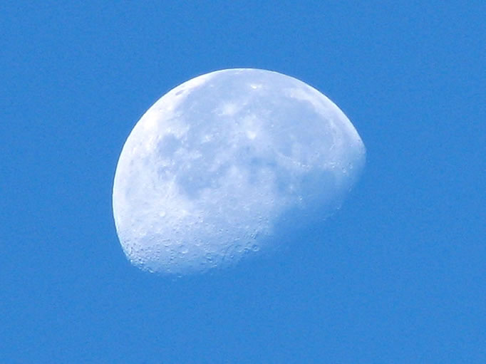 After all the hiking yesterday, we slept right through the sunrise.  As we packed up and had breakfast, we used the big telephoto to shoot the moon.