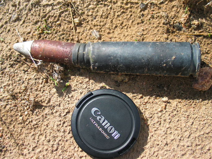 We encounter an unfired 20 mm canon shell.