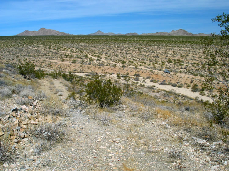 Looking down at the truck on the other side of the wash.  This road leads up from the mine to a couple of prospect pits.
