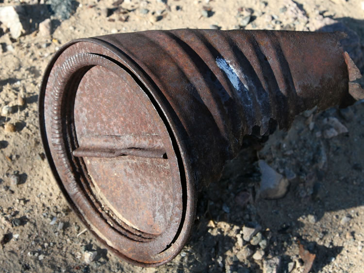 Another large carbide tin with the lid intact.