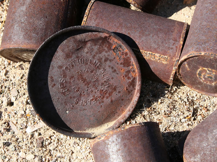 The lid is stamped "Fresh Cottolene Always Pleases."  This lid alone would date the dump to the late 1800's and early 1900's.  Apparently those old miners were very health conscious!