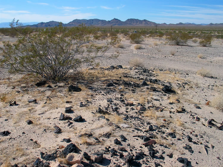 Judging from the amount of slag, fire brick and furnace parts, there was some sort of smelter here at one time.