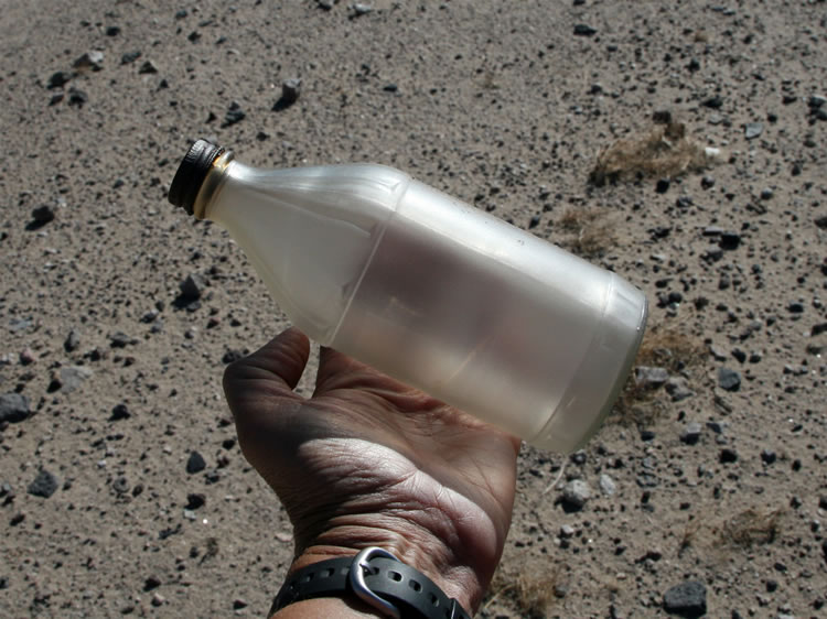 A sandblasted glass bottle.
