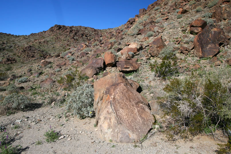 The boulder in the foreground must have been a popular spot.