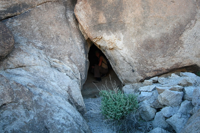 Even though this second shelter has a small opening, it's possible to easily stand erect inside.