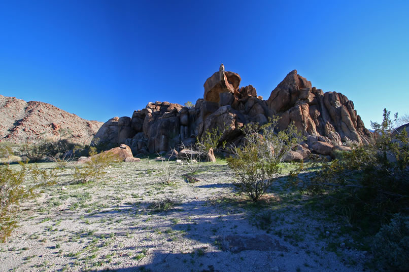 Here's a look back at the rock shelter hill as we continue toward the other mine site.  Doesn't that boulder on top of the hill look like a turtle shell with the turtle sticking its neck out?