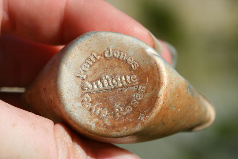 Here's a close-up of the embossing on the metal cup/cap.  This style seems to have been produced in the 1930's.