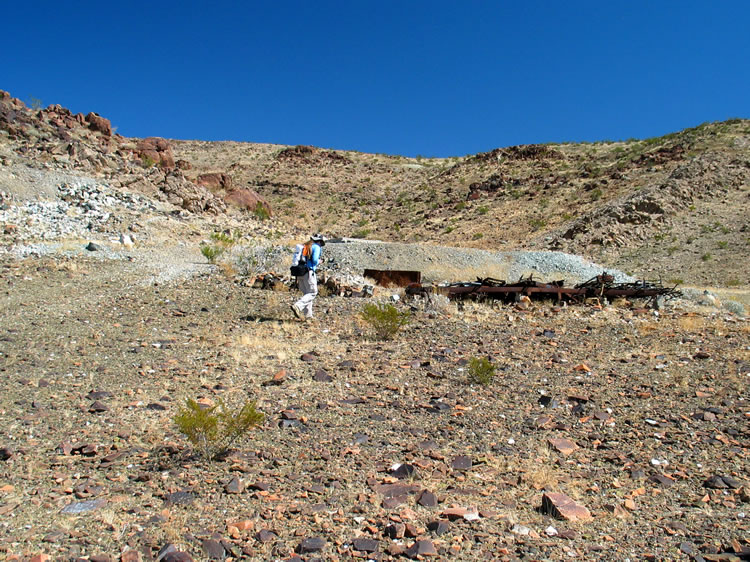 Some tailings piles, a few foundations and a burned out trailer are just below the mine.