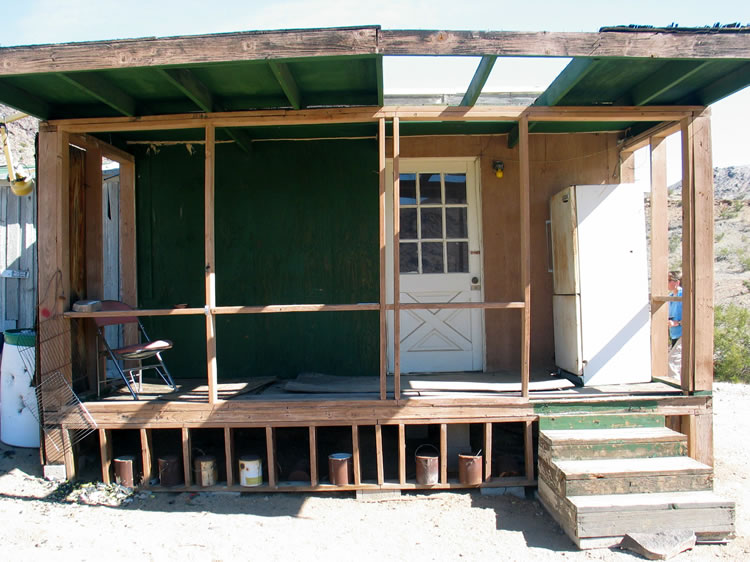 The porch and various cans of paint.