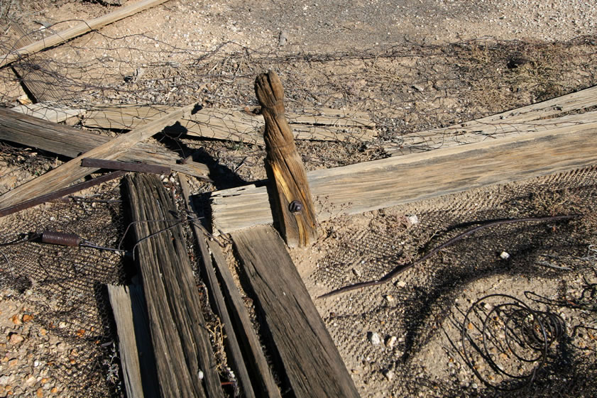 An even closer look at one of the turned wood legs on the bed.