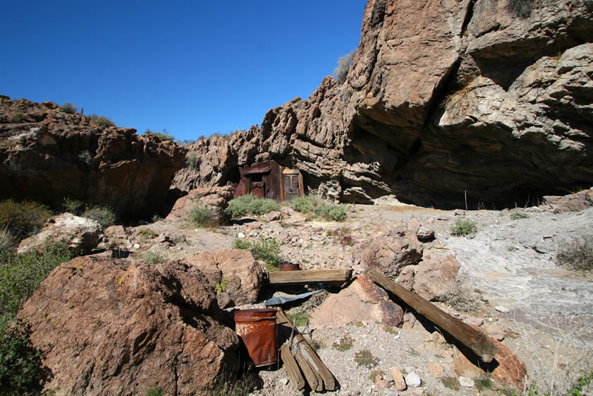 What they've discovered seems to be a rough miner's shelter built over the front of a natural rock shelter.