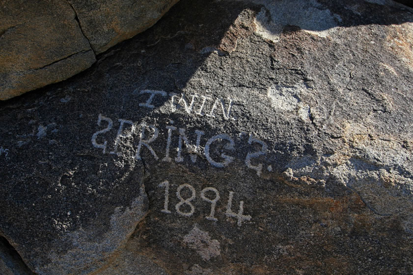 Here's a close up of that inscription.  Don't be fooled, though.  Although the inscription says Twin Springs, which are springs in the Granite Mountains, this is not at Twin Springs.