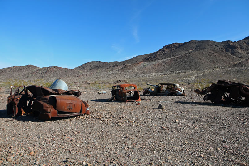 Not far from the cabins are the remains of several old cars.