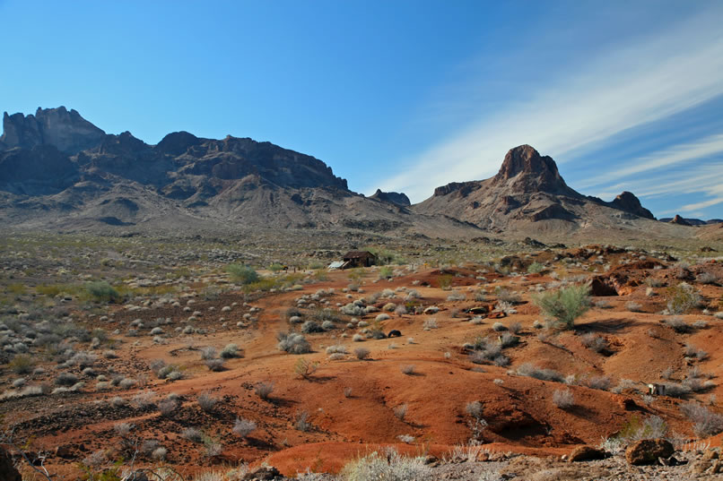 From the auto graveyard, we swing around behind the cabins and head for the old mine.