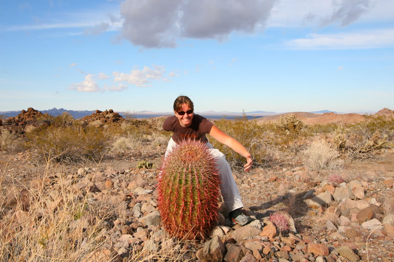 Niki poses with one of the many healthy looking barrel cacti in the area.