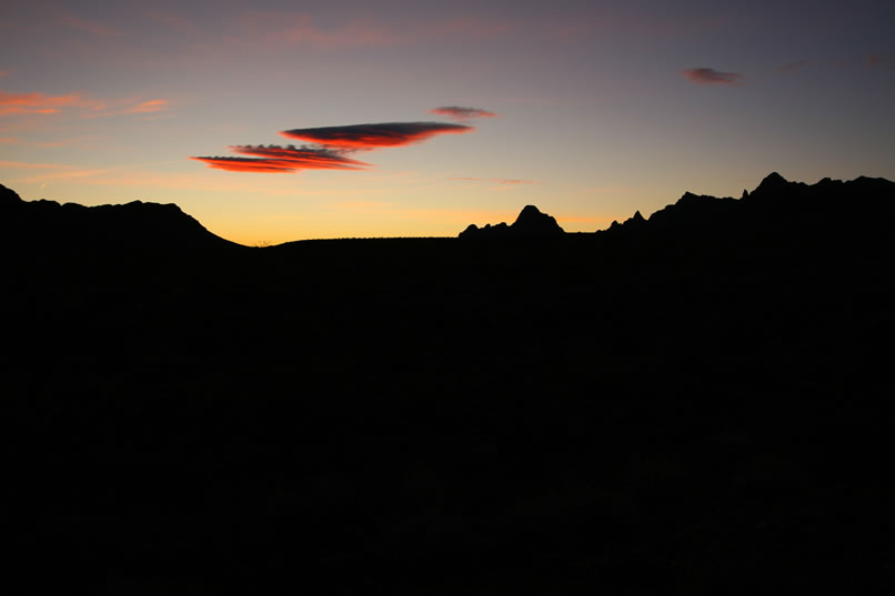 One of the joys of desert camping is sunrise.  This one starts out with bold colors which nudge us out of our sleeping bags and over to our cameras.