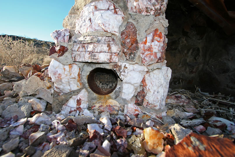 The fireplace also has a clever system for circulating air and appears to be built of rock from the nearby mine.