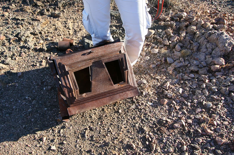 Part of a stamped sheet metal stove.