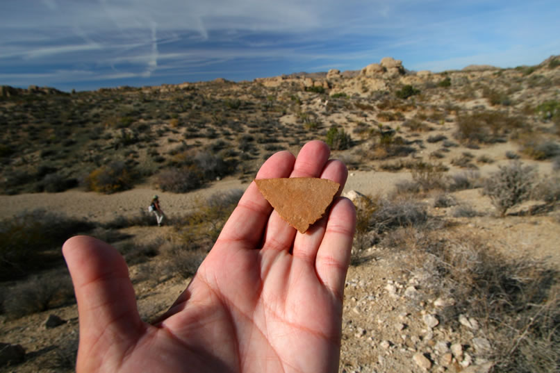 As we climb up and around the lower dryfall, we find yet another pottery fragment.