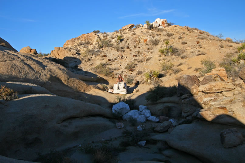 Niki takes a break on the big quartz boulder before we head off in search of the other tank.