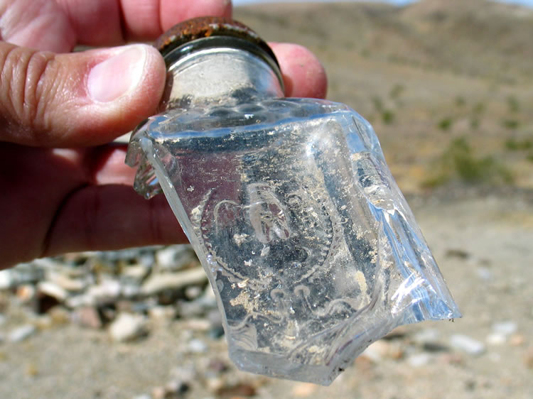 Since this trip, we've found more complete examples of this bottle at a site that would indicate a date in the 1930's.  It was a chili powder container.  Yum!  Kippered herring and chili powder!