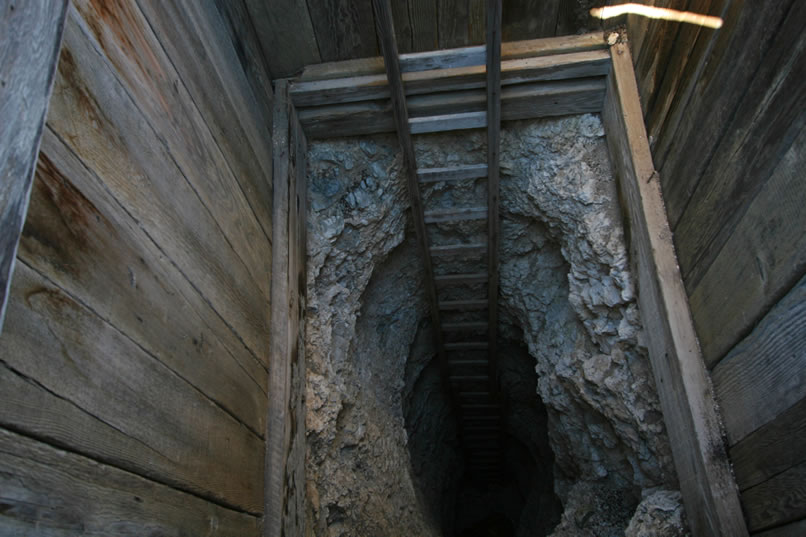 The shaft itself is deep and narrow.  Although the ladder appears to be in decent shape, we don't feel that lucky today!