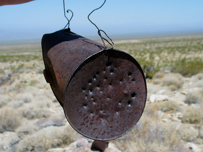 Here's a pail that has been turned into a shadowgee, or candle lantern.