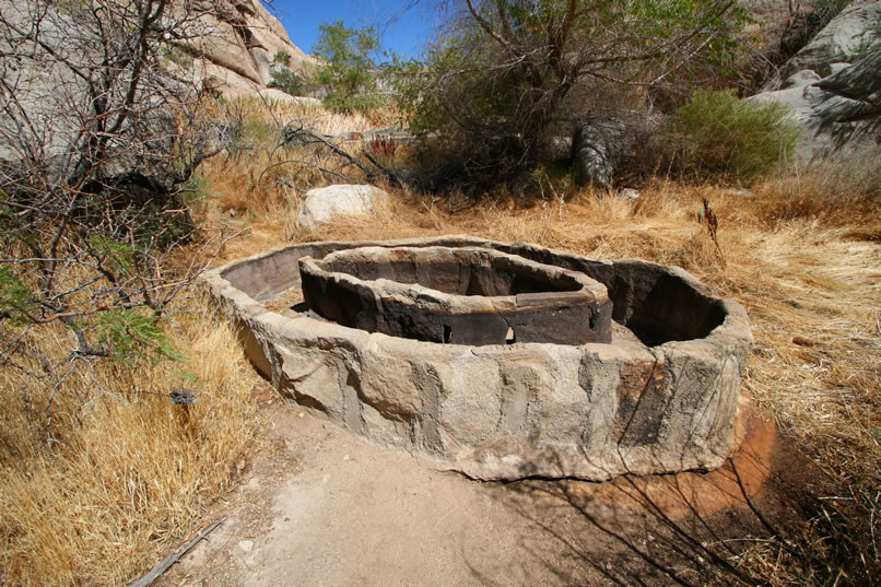 Just beyond the wooden trough, there's another very unique one built of stone by Bill Keys.  He designed the center ring to protect a float device that guarded against wasted water in this arid locale.