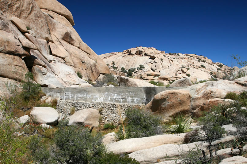 Early cowboys built the lower section of Barker Dam to create a small lake behind it which would collect water for their cattle.  Later, Keys added an additional six feet to the dam and renamed it Bighorn Dam.