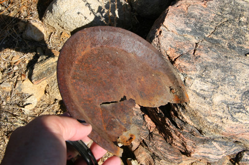 Other odds and ends turn up from the mining that took place here from 1890 through the mid-1930's, such as this metal plate.