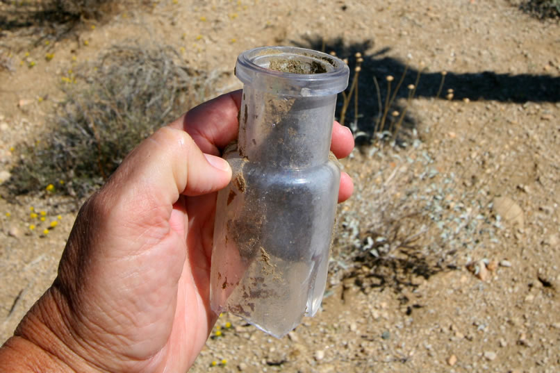 Further along we find a few interesting old bottles like this one.