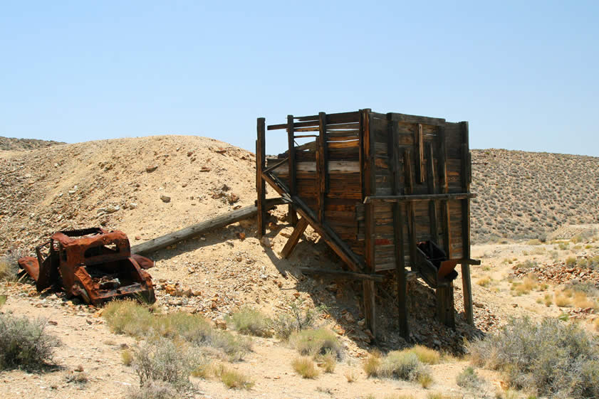 Near the large can dump, across from where we parked the truck, is an ore hopper and an old car body.