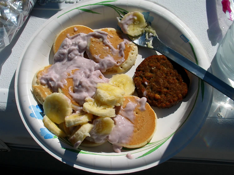 Sausage with pancakes, bananas and yogurt is on the menu today.