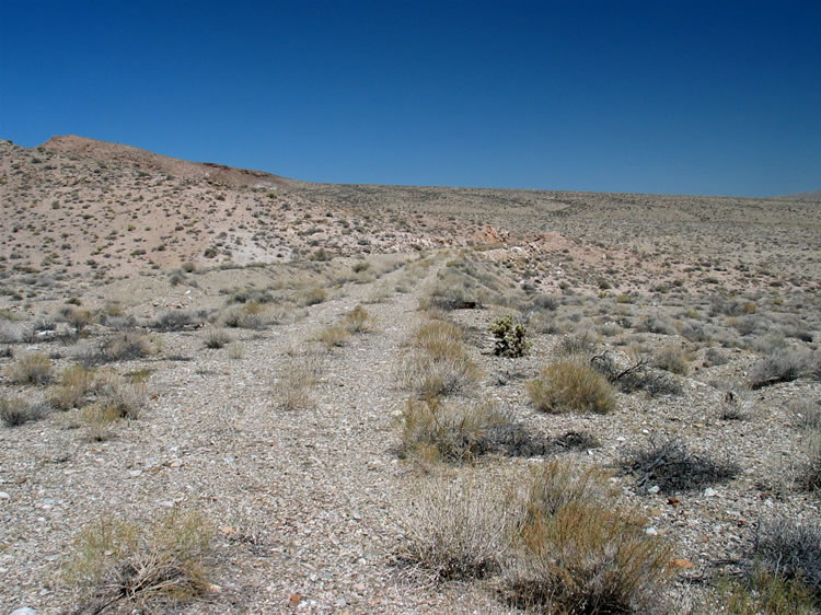 After completing our respective loops we decide to hike north along the old Silver Peak Railroad roadbed that can be seen here.  The Silver Peak Railroad ran north for some twenty miles to a junction where it joined with the Tonopah-Goldfield Line.  We aren't going that far!