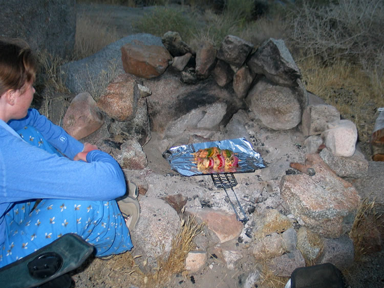 A good bed of coals makes short work of our fish kabob dinner.