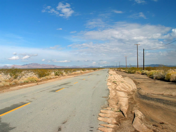 Although the roads show the effects of yesterday's rain, the day looks promising and we decide to hunt for some petroglyphs that are located in the hills ahead.