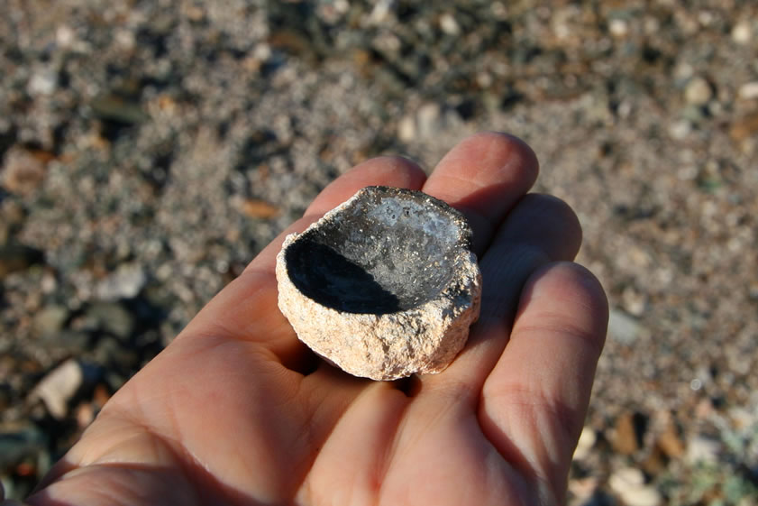 A bone ash cupel.