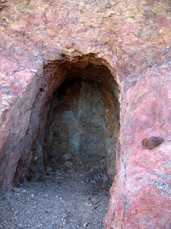 A closer look at the tunnel end.  Note the old hole and cap can to the right.