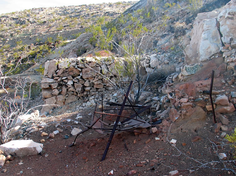 Again, we're not sure what the iron remnant is from.  It does appear that a furnace might have been located here.  Downhill from this spot numerous artifacts from the assaying process are found.