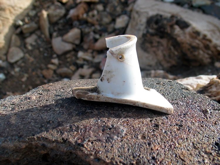 A pottery spout.