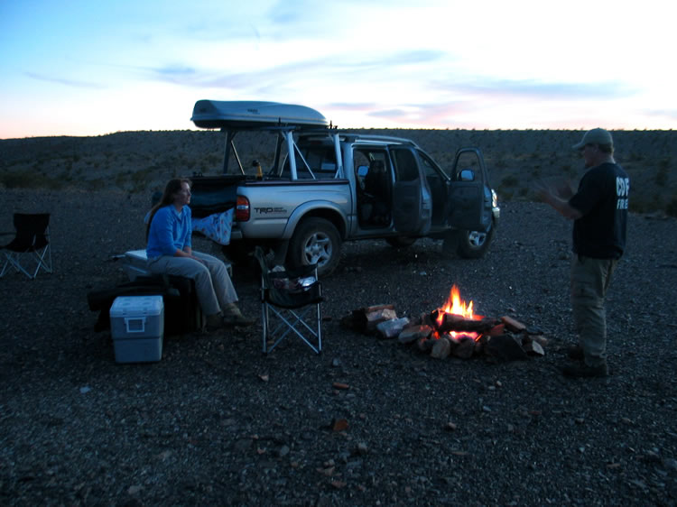 As night falls, we've set up camp near an area that we'll be exploring tomorrow.  Dan bids farewell before he heads home.