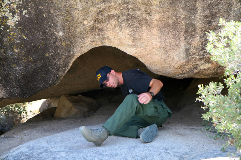 Now it's his turn to take another look around this really unique spot.  He sure has an uncanny ability to find these picto boulders!