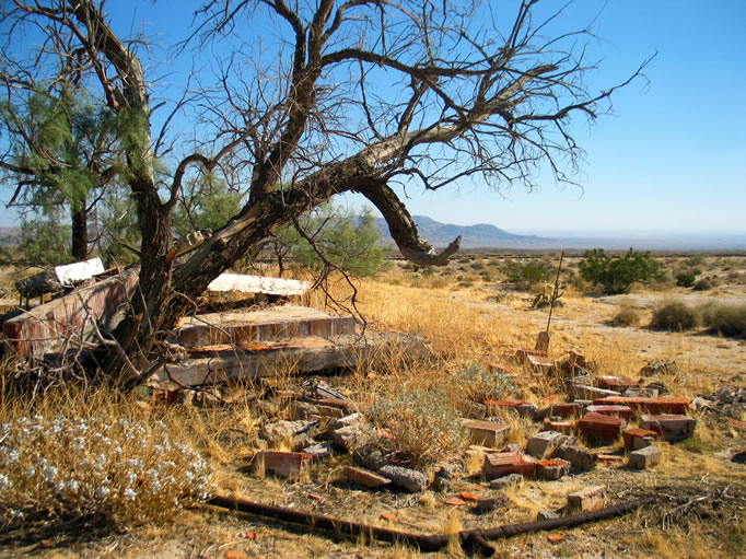 There are no standing buildings remaining, only crumbling ruins.