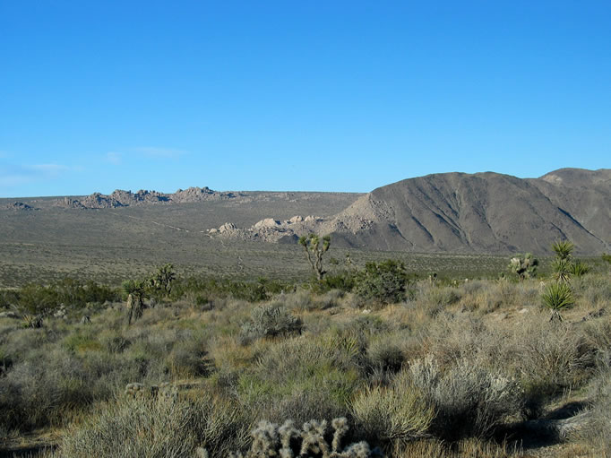 It's in that jumble of rocks at the center of the photo that Squaw Tank, an important prehistoric Indian site, is located.