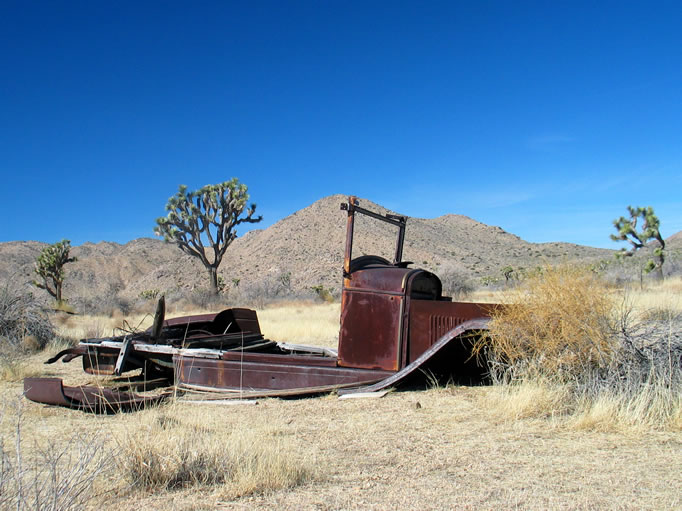 Before we get there, though, we follow the GPS to the suspected location of an old cabin. Near it we find an old car body.